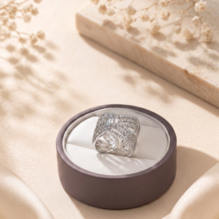 Cross-Over Stones Lined Twist Ring